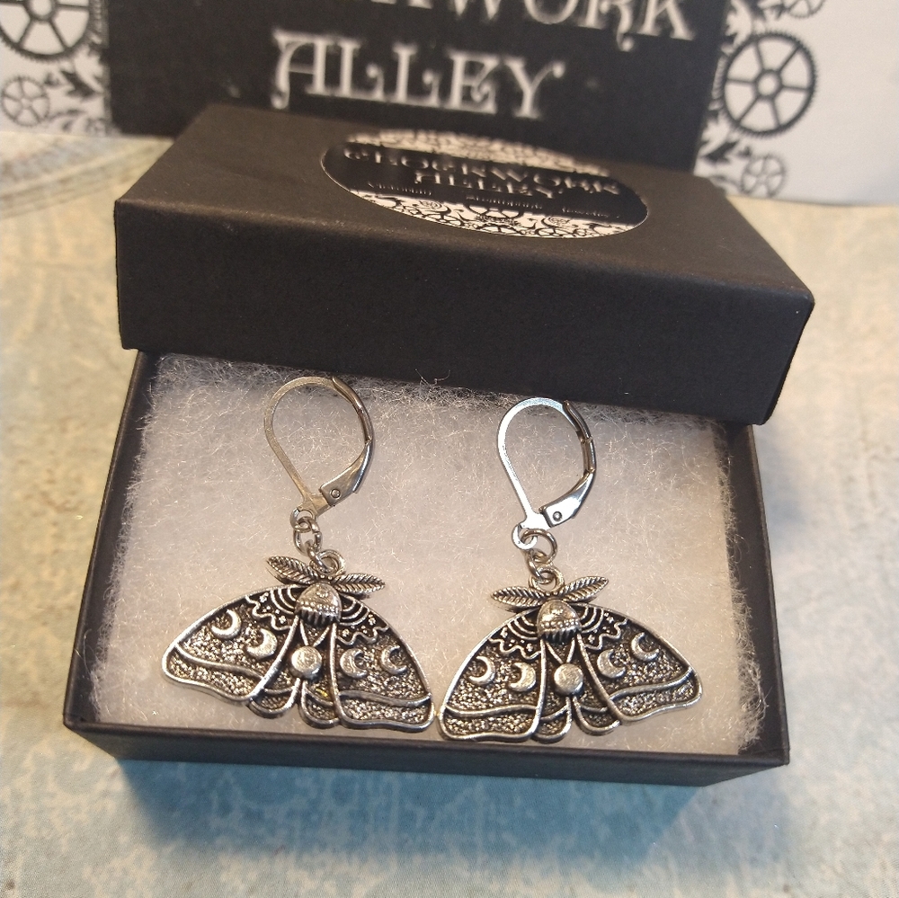 Antique Silver Lunar Moth Dangle Earrings on Stainless Steel Lever back.